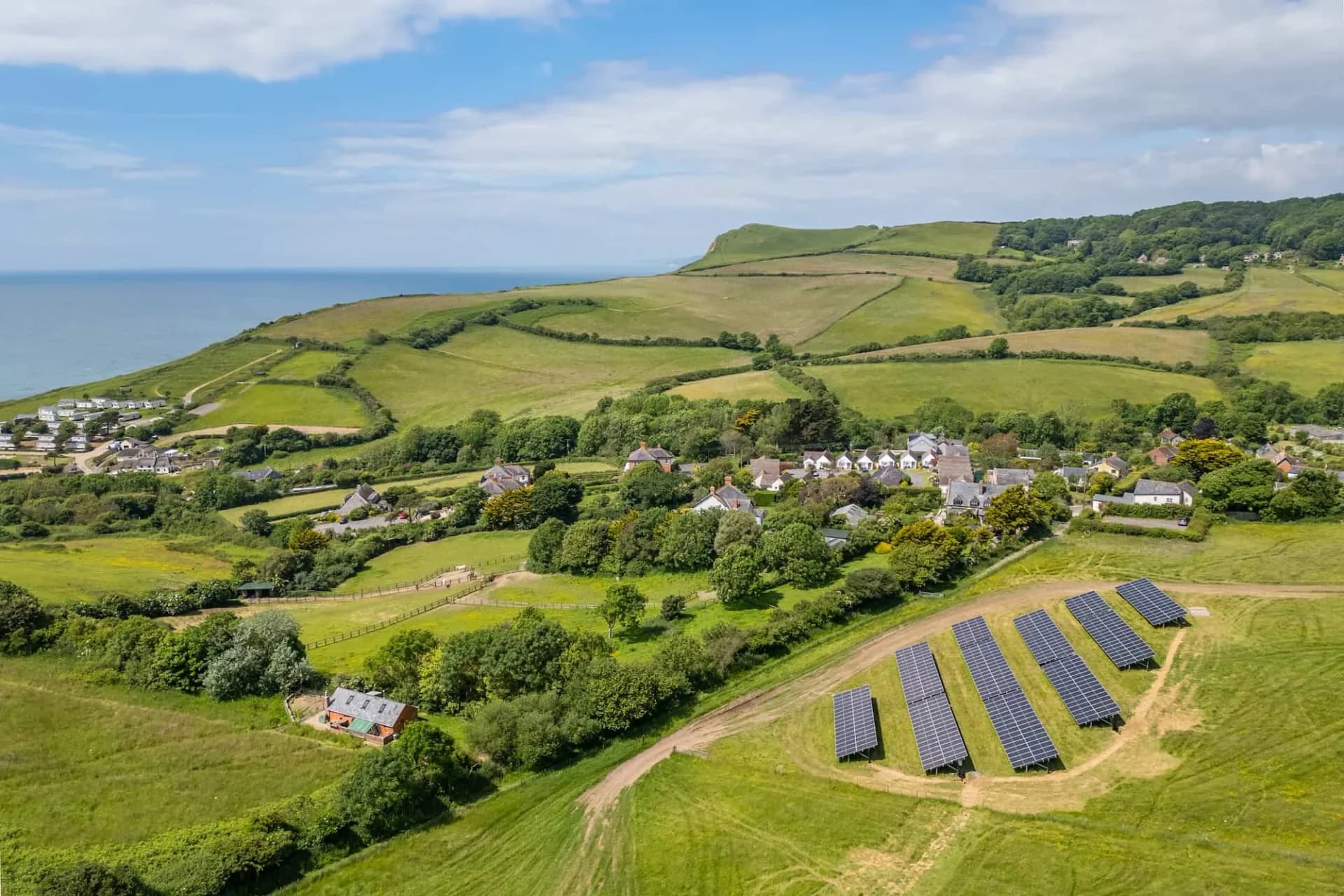 Real Solarport ground-mounted solar installation example at Highlands End in a coastal rural landscape
