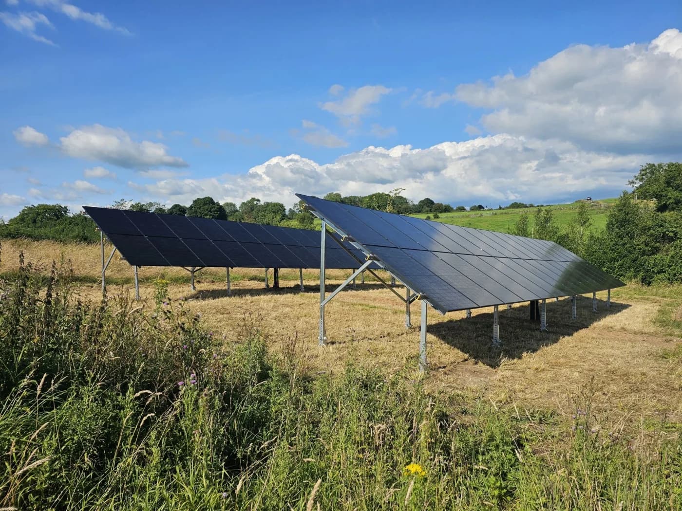 Solarport manufacturer photograph showing a ground-mount frame and foundation arrangement